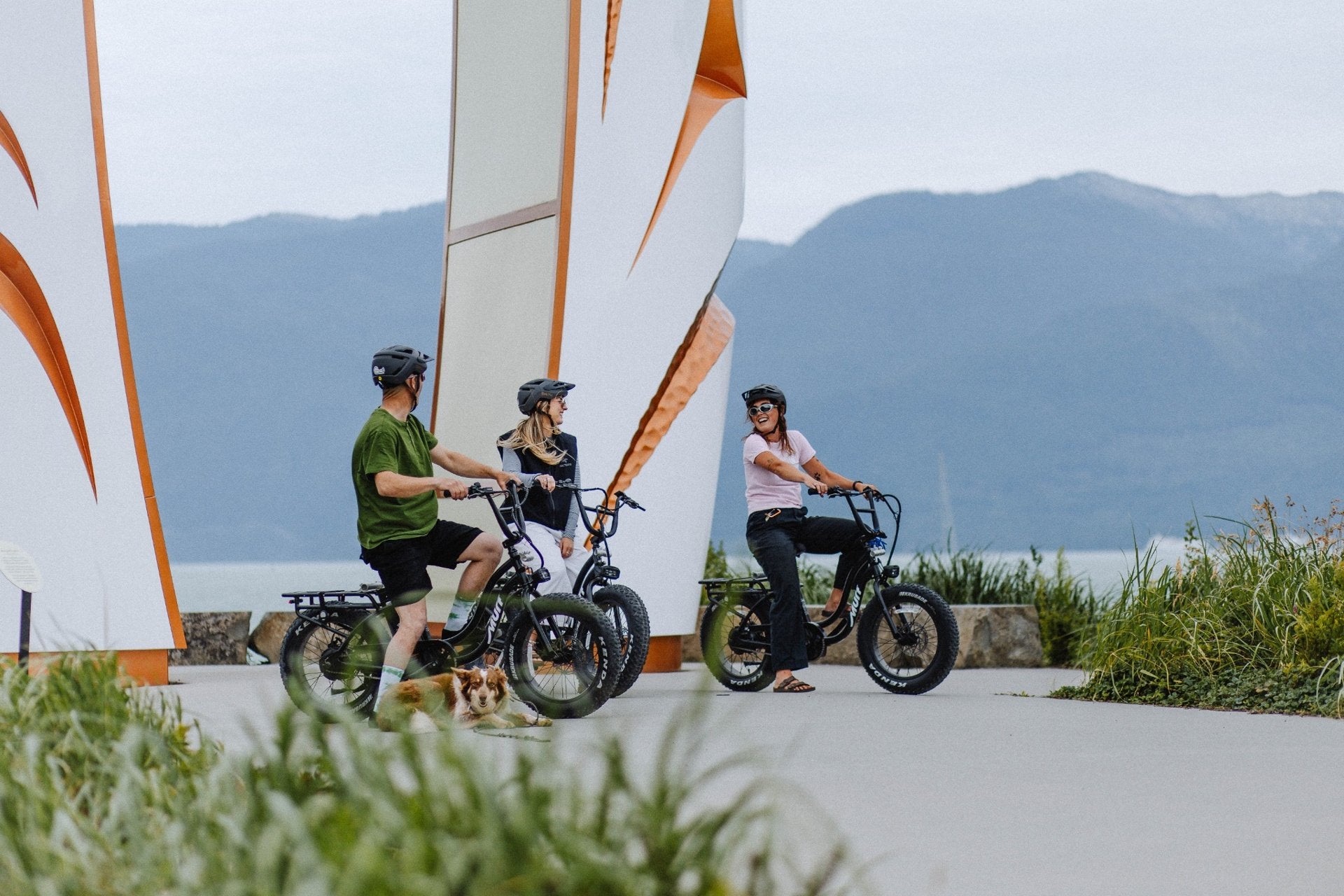 Friends with e-bikes at the Squamish oceanfront