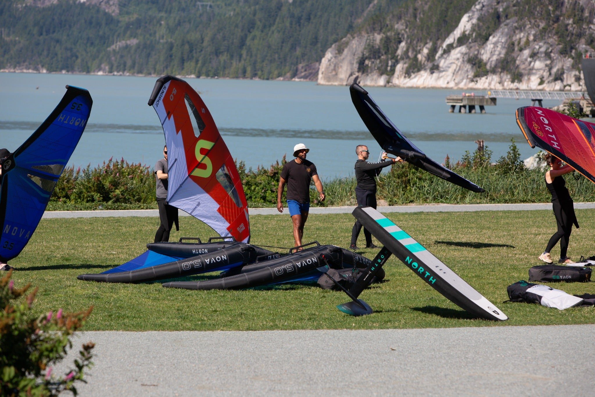 Wing foil coaching beside the water
